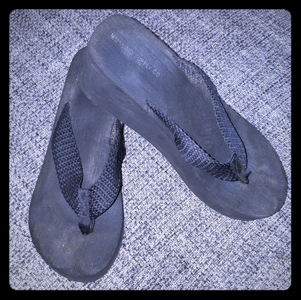 Black platform flip flop sandals